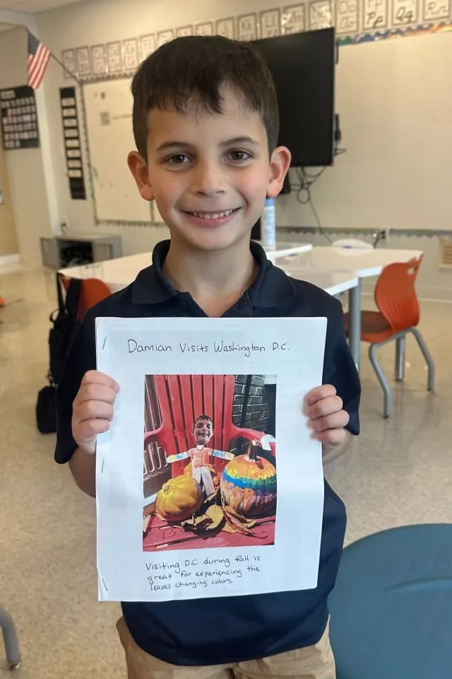 boy with image of flat stanley