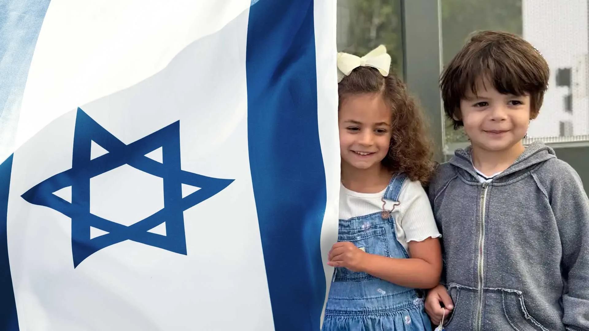 two children stand next to the Israeli Flag
